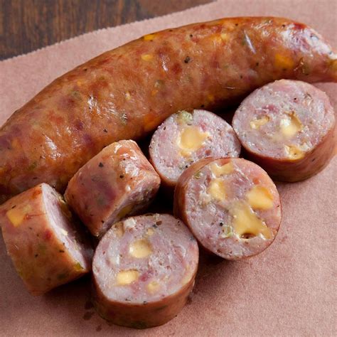 Jalapeno and cheddar sausage. Ultimate Jalapeño Cheddar Sausage 5:1 . Cheddar cheese and fresh diced jalapeño pepper add a pop of spice and irresistible flavor to this craveable, premium fully cooked sausage. ... sodium hexametaphosphate, salt, sorbic acid, artificial color), water, diced jalapeno peppers and less than 2% of the following: corn syrup, salt, nonfat dried ... 