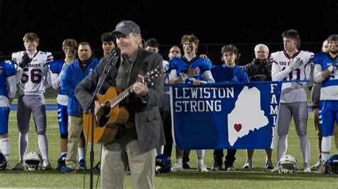 James Taylor sings national anthem at Maine high school football game