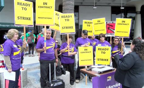 Janitors protest at San Diego International, demanding better pay