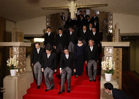 Japan PM purges Cabinet after support falls over church ties