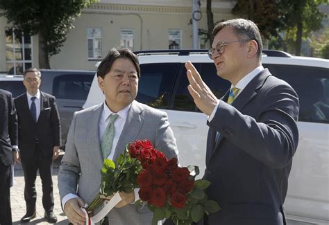 Japan foreign minister and business leaders meet Ukrainian leader and vow support for reconstruction
