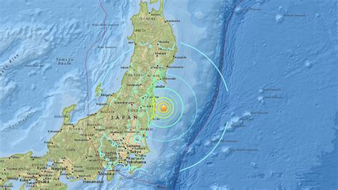 Japan lowers tsunami warning after a series of earthquakes but tells people to stay away from coast