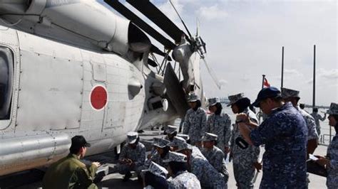 Japanese army helicopter carrying 10 crew members missing