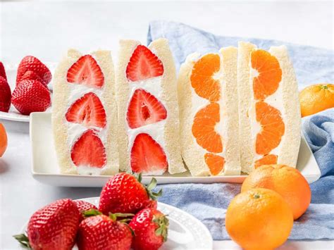 Japanese fruit sandwich near me. Trim the crusts off the bread using a sharp knife, like a bread knife. You want clean, straight edges. Then whip the cream, sugar, and vanilla until light and fluffy. Spread Cream on the Sandwich Bread. Lay out the bread slices, and spread a thin layer of cream on each one. Add Fruit. 
