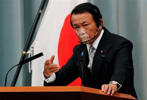 Japanese political leader Taro Aso calls for peace in the Taiwan Strait as Tokyo expands defense