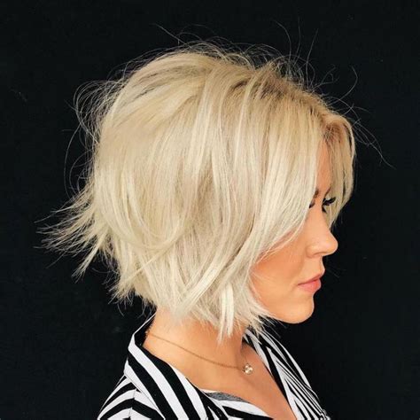 This incredible shag-inspired hairstyle is the most beautiful style designed to attract attention in the most eye-catching way; and for all the right reasons! This lady’s beautiful shaggy bob is finished below the ear and roughly around the jaw length, with lots of lovely choppy layers throughout creating a wonderful finish.. 