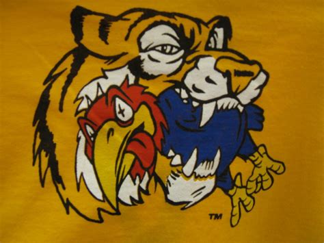 Jayhawk eating tiger. “I’m A Jayhawk” (October 2010) by Matt Schoenfeld. Talk about the Sooners, Cowboys and the Bears, Aggies and the Tiger and his tail. Talk about the Wildcats, and the Cyclone boys, But I’m the bird to make ’em weep and wail. Chorus: ‘Cause I’m a Jay, Jay, Jay, Jay, Jayhawk, Up at Lawrence on the Kaw-‘Cause I’m a Jay, Jay, Jay ... 