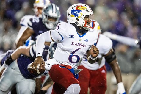 We left a lot of plays out there." Kansas quarterback Jalon Daniels is sacked by TCU linebacker Jamoi Hodge (6) during the first half on Oct. 8, 2022, in Lawrence, Kansas. (AP Photo/Charlie Riedel ...