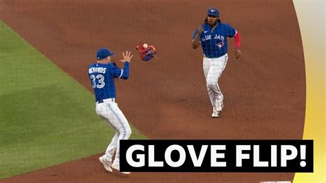 Jays 1B Guerrero flips glove to first after ball gets stuck in webbing