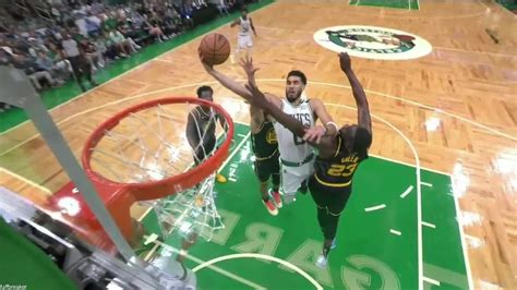 Jayson Tatum spins in for the layup in traffic NBA.com