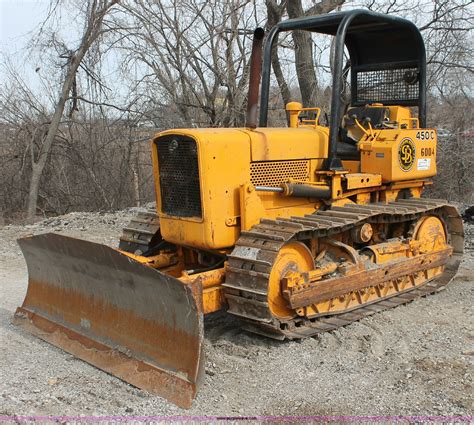 The Case 450 Dozer offers impressive specifications that make it a reliable and efficient choice for various earthmoving tasks. With its powerful engine, versatile blade, and sturdy undercarriage, this dozer can handle demanding projects with ease. Whether you're working in construction, agriculture, or forestry, the Case 450 Dozer is a .... 