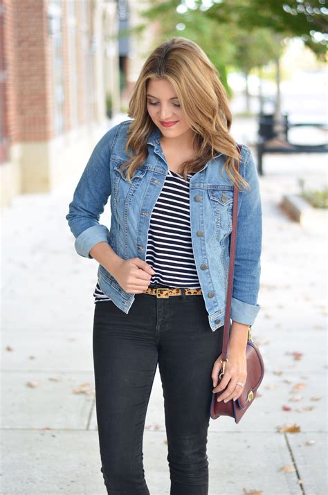 Jean jacket with jeans. The trick to wearing a denim jacket with jeans is to ensure there’s enough contrast between the jacket and the jeans colors. For example, you can wear a light denim jacket with dark wash jeans, or a blue denim jacket with black or grey jeans. Below you’ll find some examples: Contrasted Blue Double Denim … 