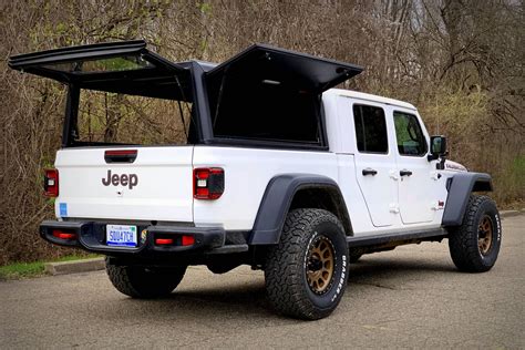 Jeep gladiator bed cap. And the bed of the Jeep Gladiator is not the same size as a standard short-bed truck. The RightLine Gear Truck Bed Air Mattress has a size to fit the Jeep Gladiator and the pump is powered with the 12V accessory outlet located in the dash. You can also go with a traditional air mattress as well. Just keep it slightly under-inflated for a nice fit. 