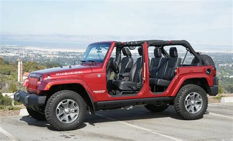 Jeep no doors. The Jeep CJ-7, introduced in 1976, sported a longer wheelbase, full-time four-wheel-drive and optional automatic transmission, steel doors and a molded plastic top, all of which we... 