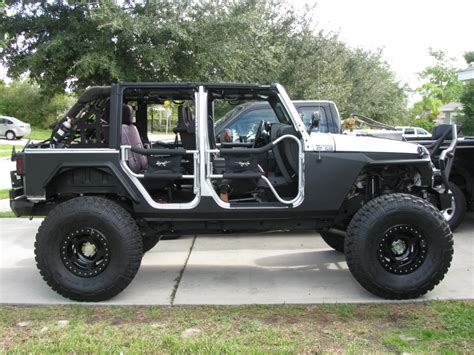 Jeeps with no doors. Driving with no doors takes the convertible experience to the next level, but it’s not without downsides. For one thing, doors represent side-impact protection, and though it’s enjoyable, we ... 