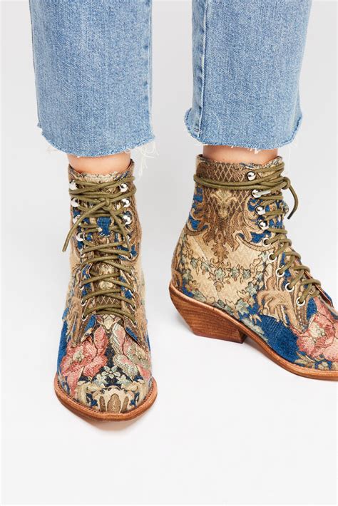 Jeffrey campbell x free people. Style No. 54679642; Color Code: Part of an exclusive collaboration between Jeffrey Campbell and Jeffrey Campbell, these vintage-inspired lace-up boots are featured in an over-the-knee design that laces all the way up. 