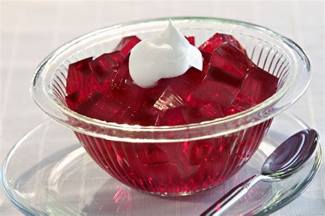 Jello. Sprinkle gelatin into a bowl with water, whisk immediately, and set aside to bloom. Strain. Use a fine mesh sieve to strain the berry mixture, using a spoon to push all the juice into the bowl. Add more water until you reach 3 cups of liquid total. TIP: For extra clear, smooth jello, use a jelly bag or nut milk bag. 