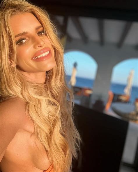 Jessica Simpson almost bares all in tiny string bikini during 