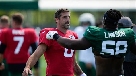 Jets' Aaron Rodgers defends Nathaniel Hackett and fires back at the Broncos' Sean Payton