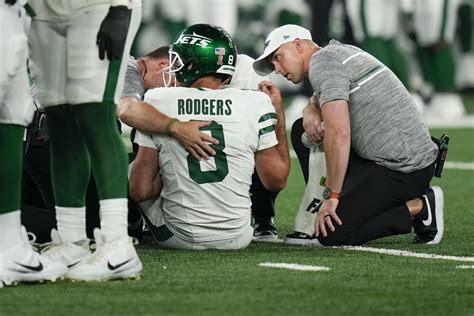 Jets’ Rodgers carted from sideline after suffering ankle injury in first series