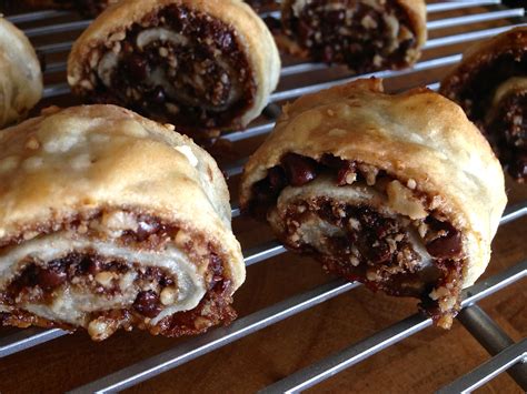 Jewish rugelach recipe. Top with the apricot filling or chocolate filling. Roll each rectangle into a jelly roll and cut into 1/2-inch pieces. Lay flat on a greased cookie sheet. Beat the egg, brush the tops of each ... 