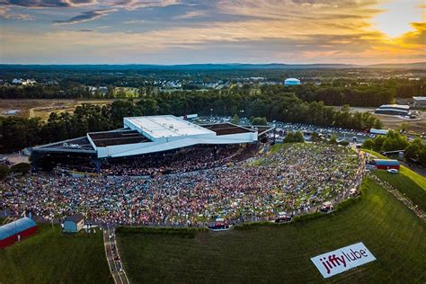 Jiffy lube arena. Jiffy Lube Live (originally known as the Nissan Pavilion) near Gainesville, Virginia, is an outdoor amphitheater in suburban Prince William County, about 35 miles west of Washington, D.C. Owned and operated by Live Nation, the amphitheater can seat 25,262: 10,444 in reserved seats and 14,818 on the lawn. 