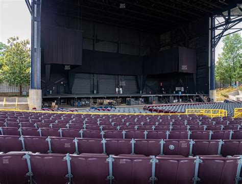 The vast majority of seats in the reserved level at Jiffy Lube Live are covered by the roof. Sections 1-3, 101-103, boxes and 201-206 are completely covered by the roof. Sections 301-306 are about 95% covered by the roof. Depending on the day and time, if you have a ticket in row N-Q in the back of sections 301-306 it possibly will not be covered.. 