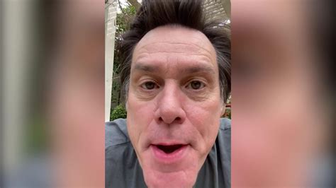 Jim carrey conspiracy. Photo by Funny on May 04, 2024. May be a meme of 2 people. 