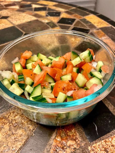 To make the Lebanese salad: In a medium bowl, combine the tomatoes, cucumbers, onion (if using), lemon juice, oil, salt, and pepper. Toss gently until well combined. Cover and refrigerate for up to 8 hours. Position racks in the top third and middle of the oven and preheat the oven to 350°F.. 