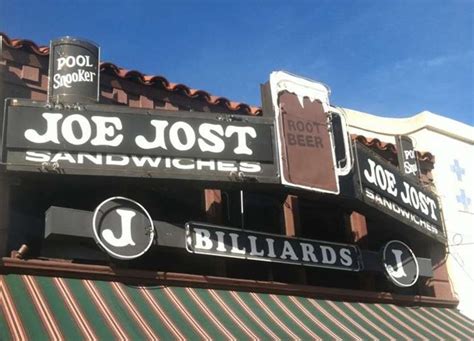 The Best Dive Bar. Joe Josts is an iconic and much revered beer bar located in Long Beach, CA. Established in 1924, this venerable bar looks like you stepped back in time. A long bar with wooden booths in the front room and pool tables in the back room.