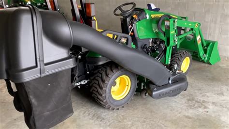 How to remove a material collection system from a John Deere 1025R tractor.. 