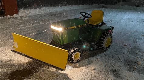John Deere 318 Snow Plow. 