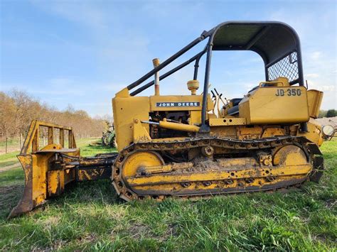 John deere 350 dozer value.  It uses dual hydrostatic transmissions with...
