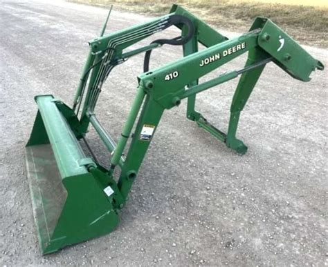 John deere 410 front end loader specs. ) Front Tires .  The lifting capacity is 8...