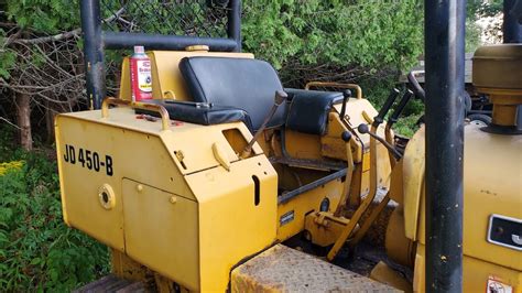 Hi, I have a 2002 john deere 250skidsteer . The problem is alternator not charging and no exterior lights. I tested the battery and it's ok. ... We have a 1980's John Deere 550 Dozer and we are loosing hydraulic fluid under the dozer, just a slow drip, however it has stopped driving. Where is the oil resevour for the gearbox..