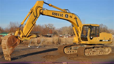  John Deere 690E LC Excavator, 11353 Hrs Showing, 140 Hp, John Deere 6068T Engine, Diesel, Water Cooled Engine, Hydrostatic Transmission, 3' Bucket Width, Equipped W/ Thumb, SN: DW690EL553216 Get Shipping Quotes Opens in a new tab . 