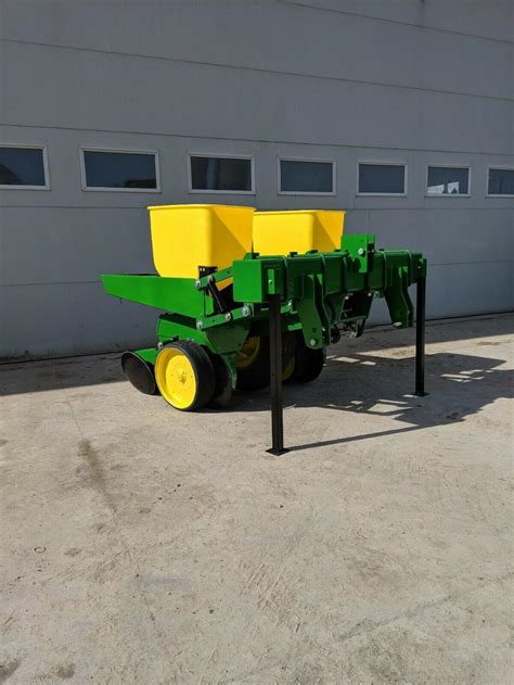 model name / number: 7000. John Deere 7000 Corn Planter, 4 Row, 30" Row Spacing, Dry Fertilizer, Corn And Bean Meters, Double Disc Fertilizer Openers, Insecticide Boxes, Owners Manual, Good Condition, Call Dave show contact info. post id: 7739643461.. 