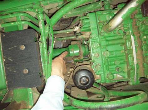 Subject: RE: John Deere 7800 / 7810. Indiana. We had a 7800 that was running 205hp. We advanced the timing, changed the injectors and added a bunch of weight. We pulled a set of 750 drills with it, 28ft disk, and a 30ft cultimulcher. The problem we had was that the tractor always ran 2 bars from the red on the temp guage.