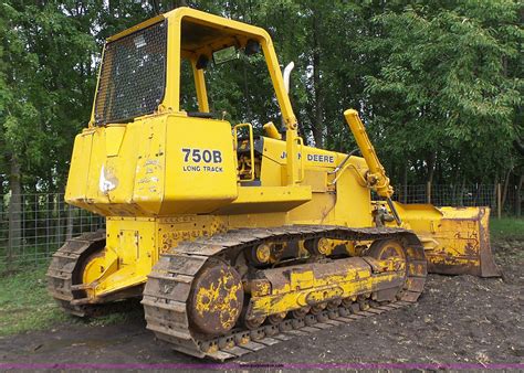 John deere 750b dozer specs. 82.0 kW. Mechanical. Drive. crawler. Four-post ROPS. Cab available with air-conditioning. Photos. No photos of the John Deere 750 are currently available. To submit yours, email it to Peter@TractorData.com. Photos may only be used with the permission of the original photographer. 