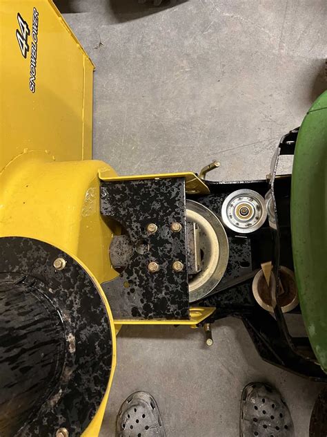 John deere snowblower modifications.  Also includes adding two more paddles ...