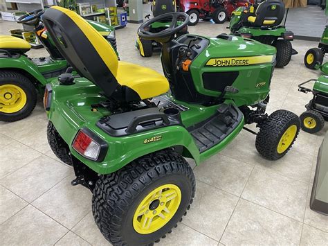 X739 Signature Series 4-Wheel Steer, 4-Wheel Drive Tractor, Less Mower Deck, Model Year 2023. ... (363-kg) capacity or 350 lb (158 kg) when using swivel feature to dump 16YS Swivel Cart is unique in the lineup of John Deere carts in that it can be swiveled 120 degrees to either side for easier unloading. The operator can simply pull up next to .... 
