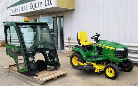  JOHN DEERE X758/60HC, 4 WHEEL DRIVE LAWN & GARDEN TRACTOR, 2018, 24hp, Yanmar, 3 cylinder, diesel, liquid cooled engine, 4WD plus rear differential lock, 60" high capacity shaft driven drive over mower deck, dual pedal foot controlled hydrostatic transmission, cruise control, power steering, tilt steering wheel, hydraulic deck lift, high back professional seat, auxiliary hydraulics for front ... . 