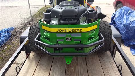 Many larger zero turn mowers have a built-in hitch where you can attach equipment that you can tow. ... John Deere zero turn towing capacity. John Deere zero turn model Weight Towing capacity; Z335E: 491 lbs: 245 – 294 lbs: Z345R: 500 lbs: 250 – 300 lbs: Z345M: 496 lbs: 248 – 297 lbs: Z355E:. 