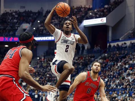 Johnson and Newton lead No. 5 UConn to a 69-65 win over St. John’s in Big East home opener