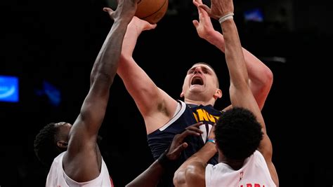 Jokic, Porter, Murray power Nuggets to 108-102 win over Nets