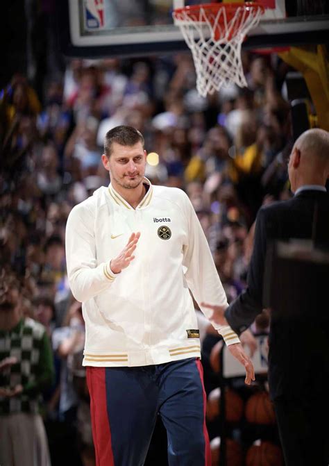 Jokic and the Nuggets receive rings, watch championship banner raised before tipping off season