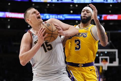 Jokic leads Nuggets past Lakers 113-111, and into first NBA Finals