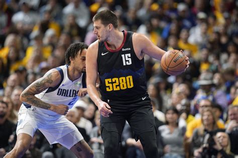Jokic scores 33 points, leads Nuggets to 125-114 win over Mavericks in NBA tournament opener