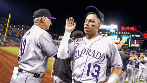 Jones homers and Trejo has 4 hits as the Rockies beat the Nationals 10-6