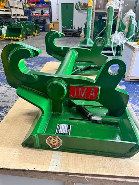 Jrb quick coupler wheel loader.  Joystick Loader Valve.  Forks are straight and in go...